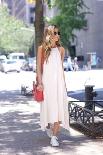 White maxi dress with red Celine bag and Isabel Marant sneakers