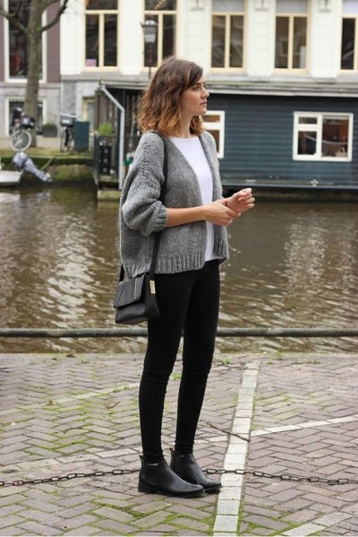 Blogger Mango and Salt wears a white t-shirt, cropped cardigan, shoulder bag, skinny jeans, and black ankle boots