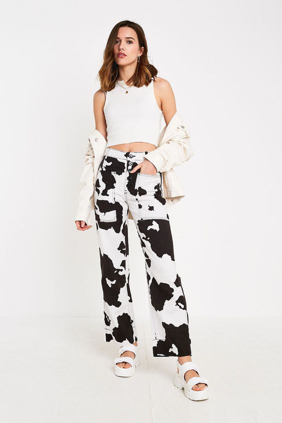 Bold cow print jeans from BDG with an allover pattern.