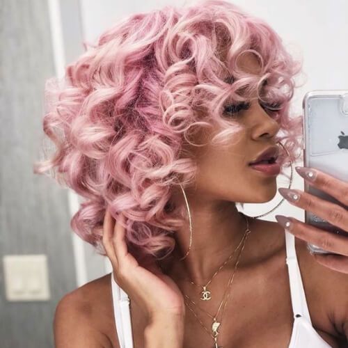 pink curly hair with bang